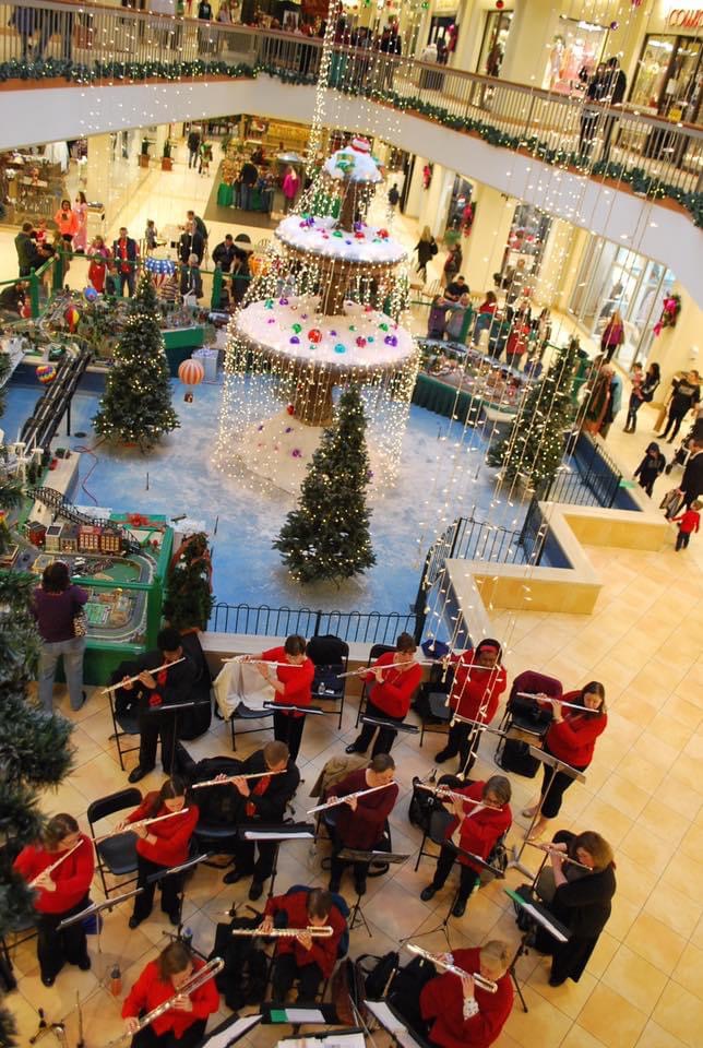 Aerial view of Baltimore Flute Choir performing at Kenilworth with holiday decorations