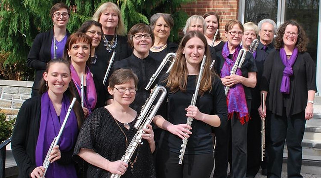 Baltimore Flute Choir holding flutes of various sizes
