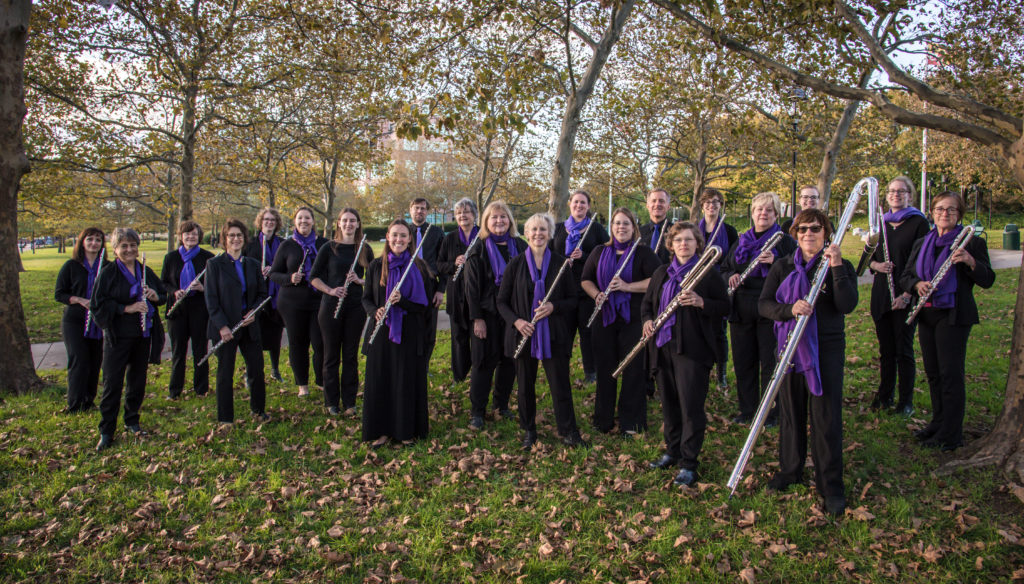 Baltimore Flute Choir members holding flutes of various sizes